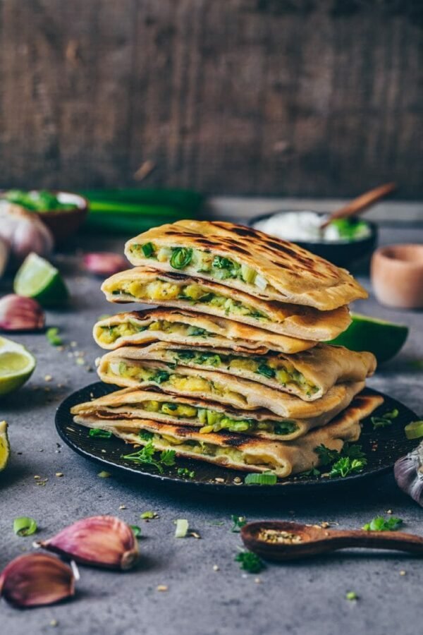 Paratha (Alo/Gobi) bread stuffed with Patato or Cauliflower spices and herbs.