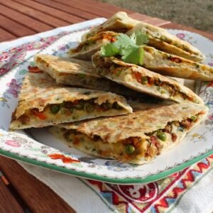 Keema Naan Soft, unleavened bread with your choice of meat, prepared in tandoor.